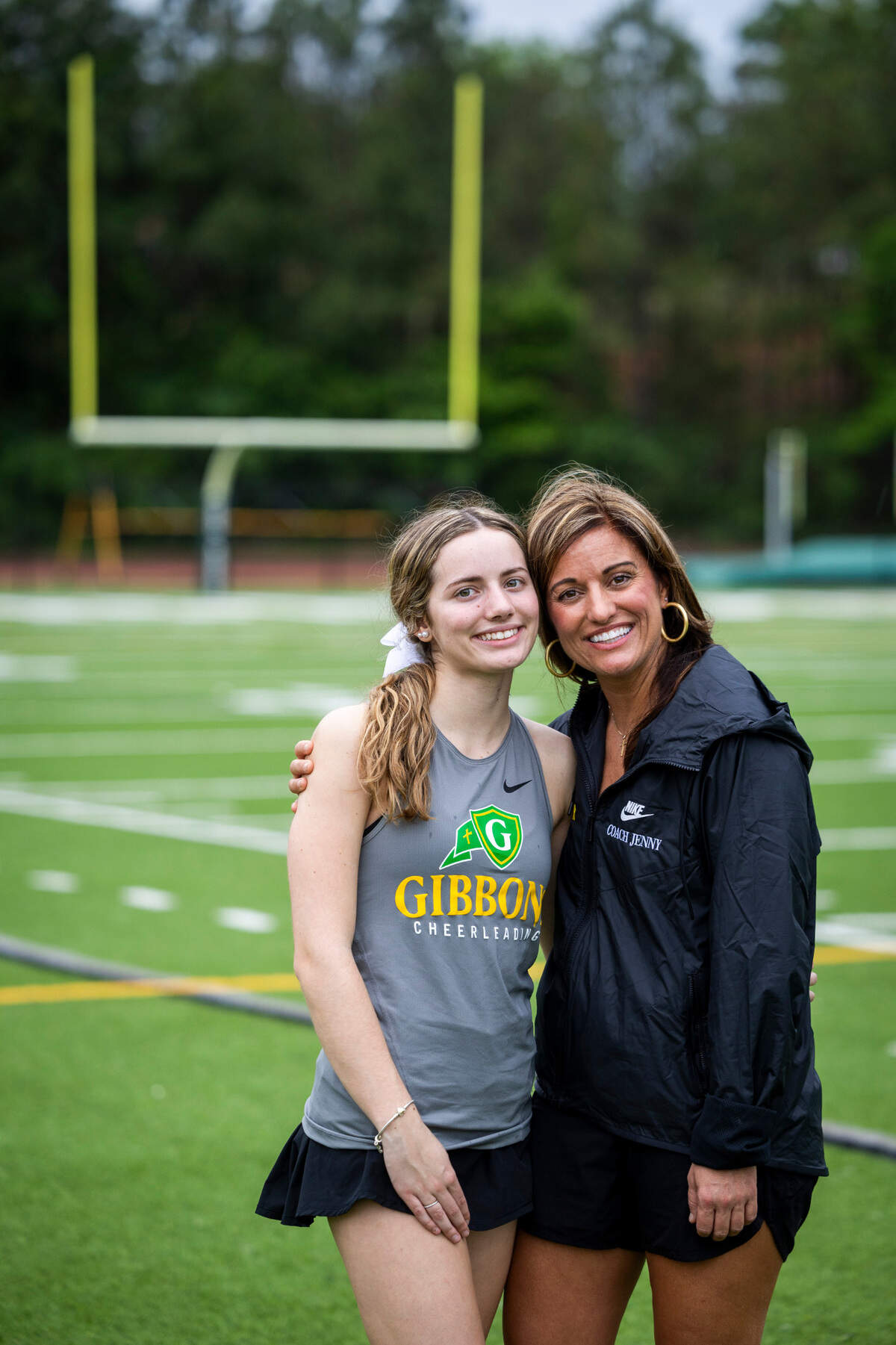 Coach Jennifer Marks and her daughter Ava Marks of the Cardinal Gibbons’ cheerleading squad.