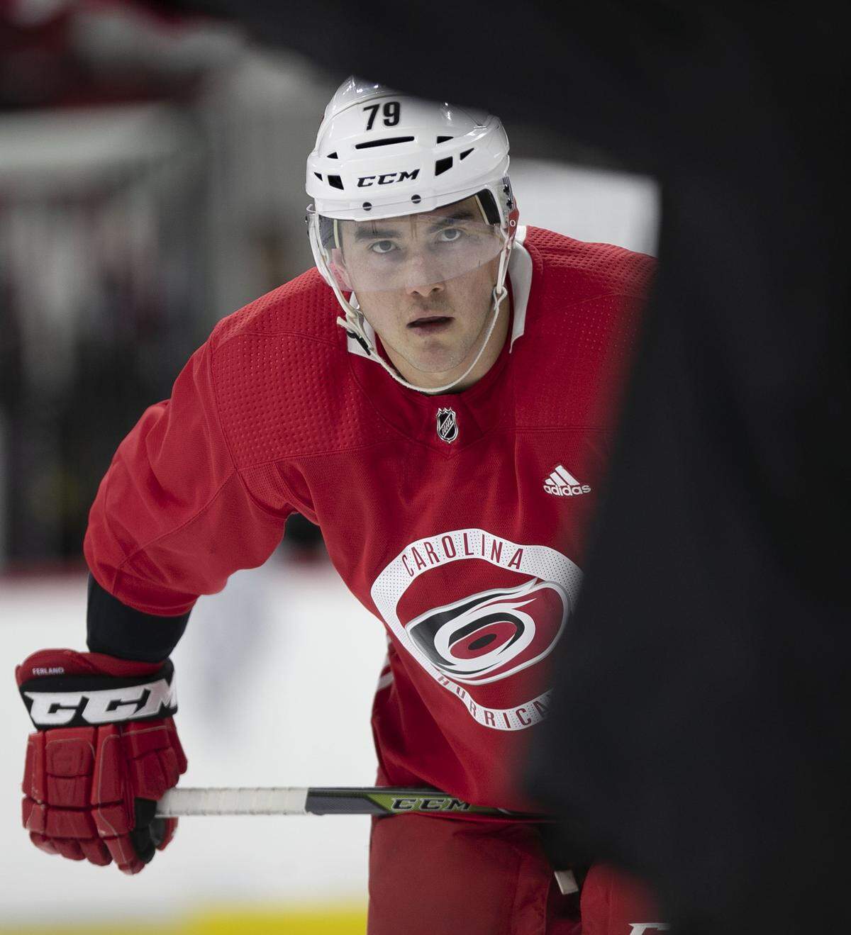 Carolina Hurricanes’ Micheal Ferland (79) listens to coach Rod Brind’Amour during practice on Tuesday, April 9, 2019 at PNC Arena in Raleigh, N.C.
