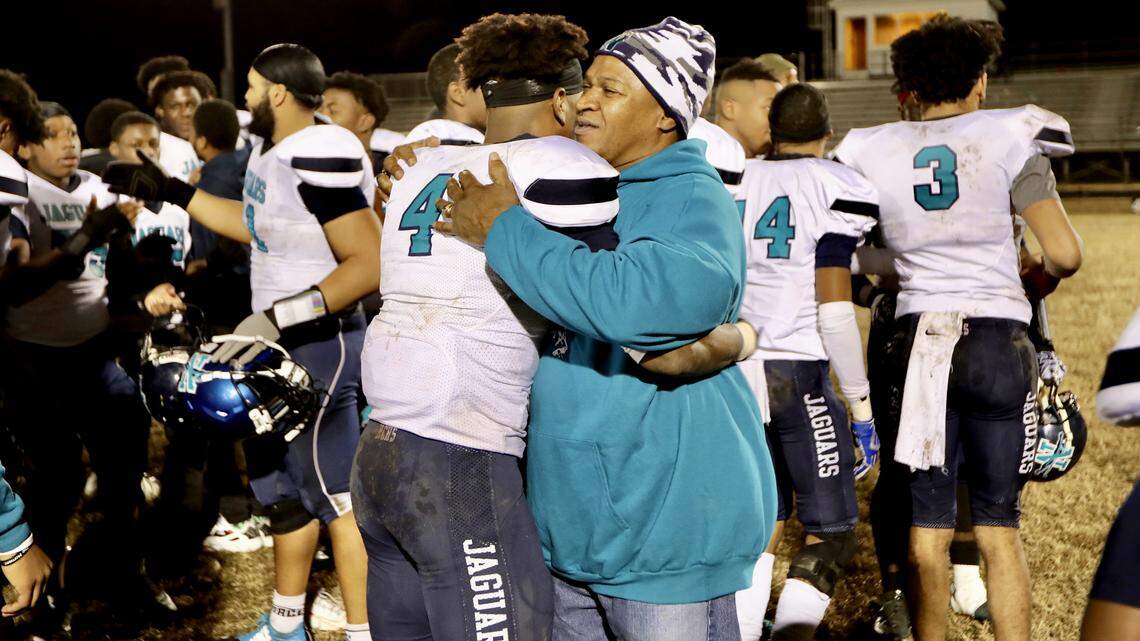 Na’Jae Newsome (4) hugs Ivan Clayton (right) following Northampton County High School’s 20-12 victory over North Edgecombe High School in the semifinals of the North Carolina 1A High School Football Playoffs in Tarboro, N.C. on December 6, 2019.