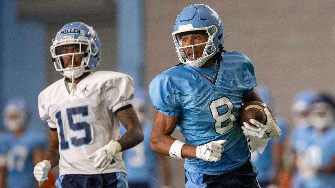North Carolina wide receiver Kobe Paysour (8) carries the ball during the Tar Heels’ first practice of the season on Wednesday, August 2, 2023 in Chapel Hill, N.C.