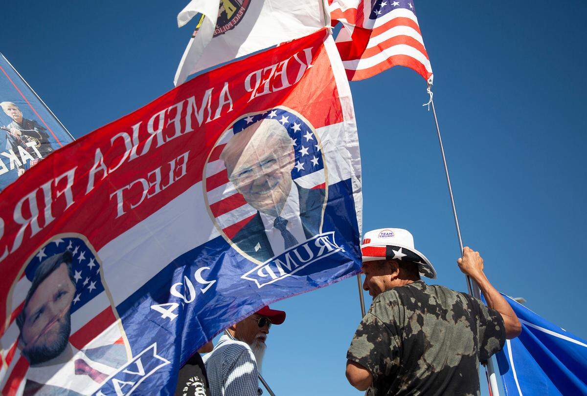 Crowds gather outside of Greensboro Coliseum prior to a rally held by former President Donald Trump on Tuesday, Oct. 22, 2024, in Greensboro, N.C.