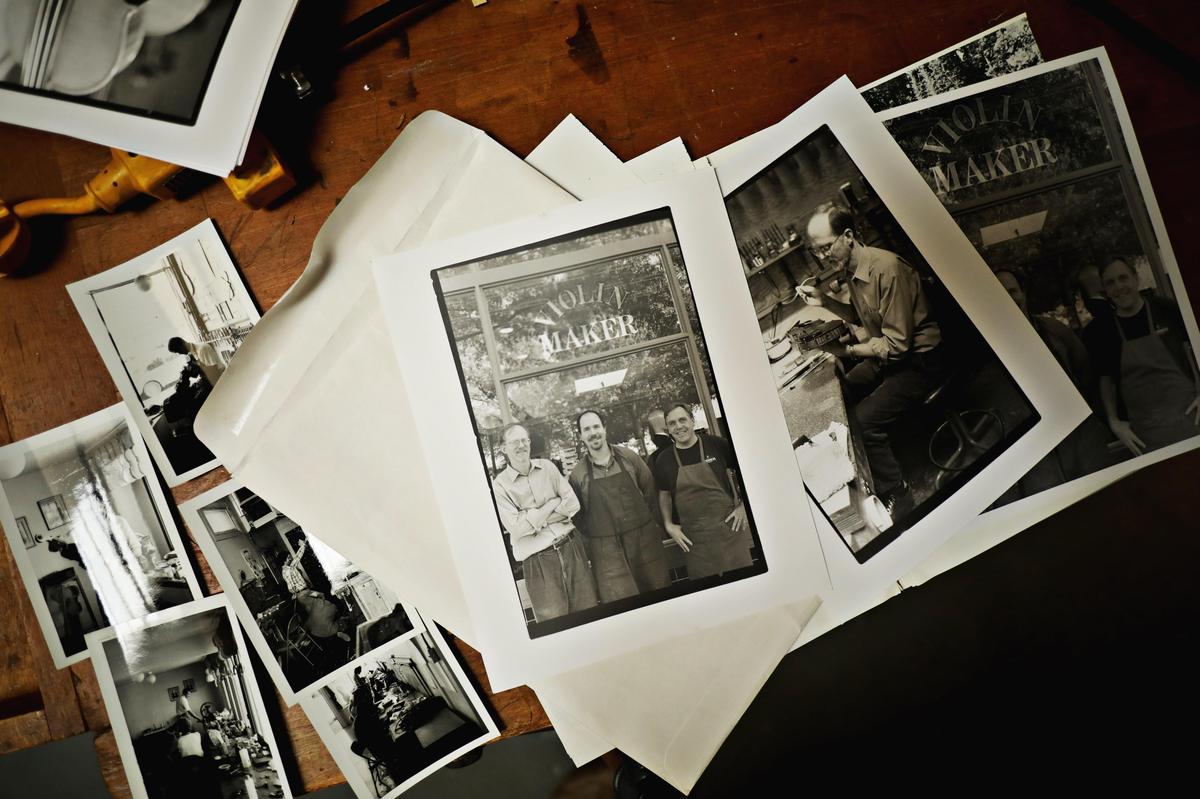 Photos taken during Raleigh violin maker John Montgomery’s school days, left, as well as shots from several years ago at his shop on Hillsborough Street where it has been since 1987.