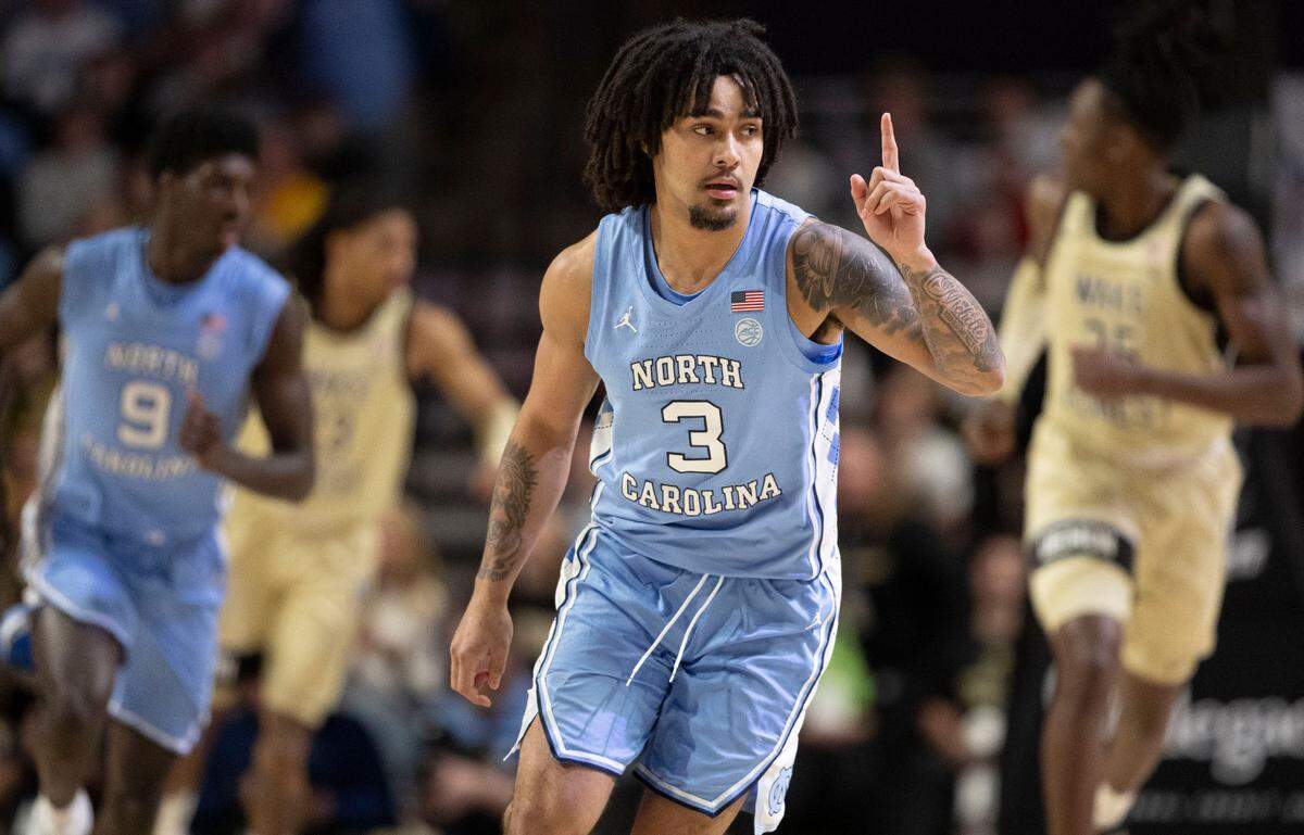 North Carolina guard Elliot Cadeau (3) reacts after scoring, and calls the defensive set, in the first half against Wake Forest on Tuesday, January 21, 2025 at Lawrence Joel Coliseum in Winston-Salem, N.C.