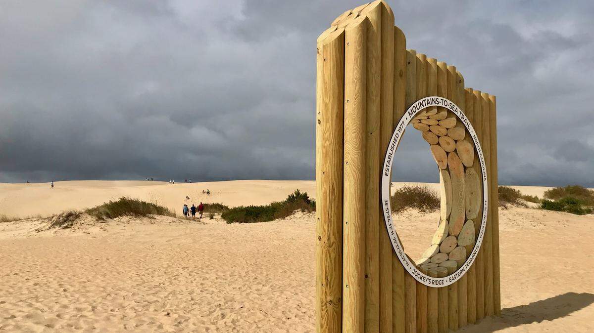 A monument marking the beginning and the end of the Mountains-to-Sea Trail was unveiled in Jockey’s Ridge State Park in Nags Head on Sept. 29, 2023. The trail runs 1,175 miles from the park to Great Smoky Mountains National Park.