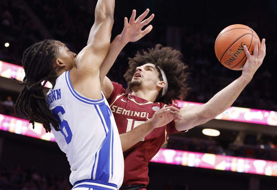 Florida State's Lajae Jones (10) shoots as Duke’s Maliq Brown (6) defends during the first half of Duke’s game against Florida State in the quarterfinals of the 2026 ACC Men’s Basketball Tournament at the Spectrum Center in Charlotte, N.C., Thursday, March 12, 2026.