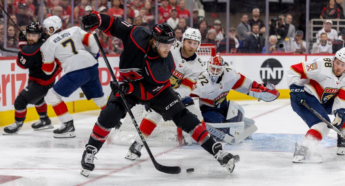 Carolina Hurricanes center Mark Jankowski (77) works to score against Florida Panthers center Sam Bennett (9) in the first period during Game 5 of their Stanley Cup series on Wednesday, May 28, 2025 at Lenovo Center in Raleigh, N.C
