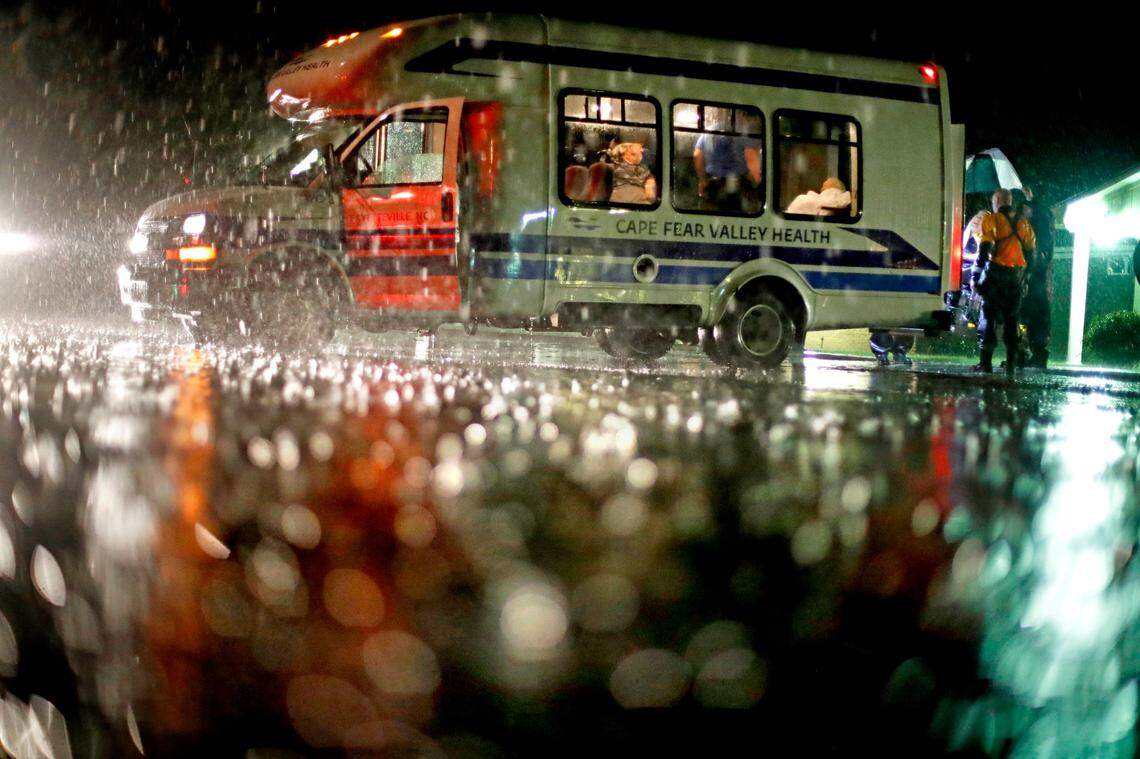 Residents of an assisted living facility are evacuated to a church as a precaution against potential flooding the city could see from tropical storm Florence in Fayetteville, N.C., Saturday, Sept. 15, 2018. After blowing ashore as a hurricane with 90 mph (145 kph) winds, Florence virtually parked itself much of the weekend atop the Carolinas as it pulled warm water from the ocean and hurled it onshore.