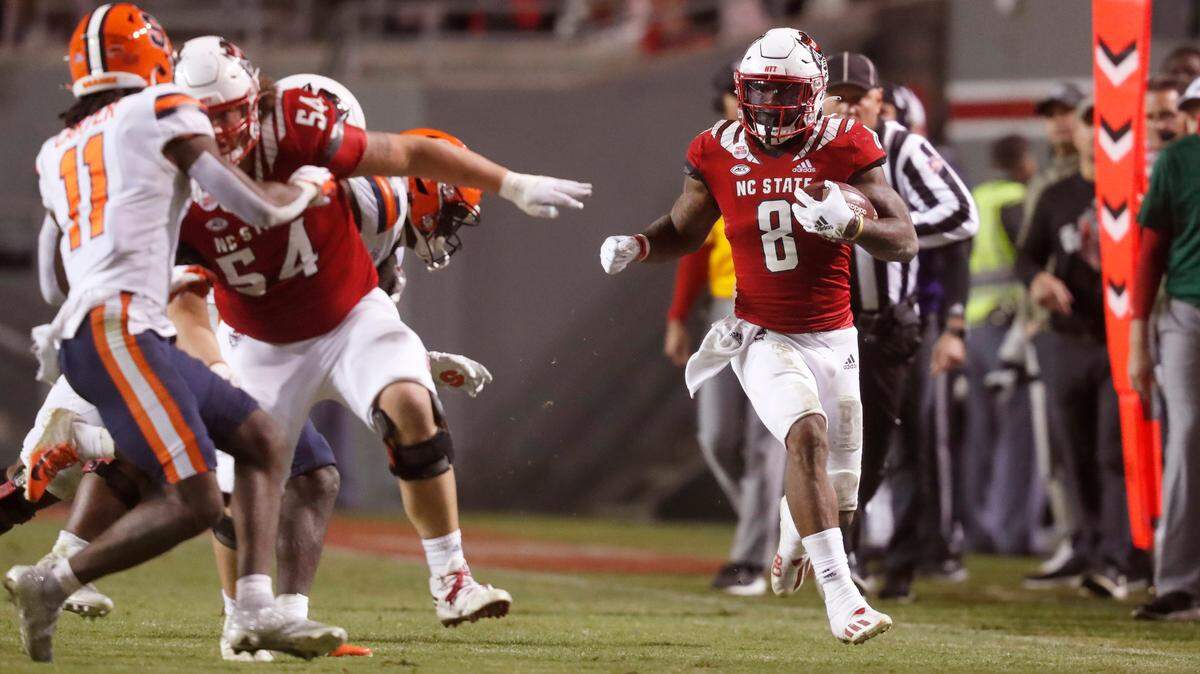 N.C. State running back Ricky Person Jr. (8) heads downfield during the second half of N.C. State’s 41-17 victory over Syracuse at Carter-Finley Stadium in Raleigh, N.C., Saturday, Nov. 20, 2021.