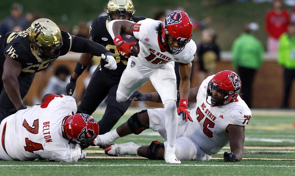 N.C. State’s KC Concepcion (10) breaks free on a run during the second half of N.C. State’s 26-6 victory over Wake Forest at Allegacy Stadium in Winston-Salem, N.C., Saturday, Nov. 11, 2023.