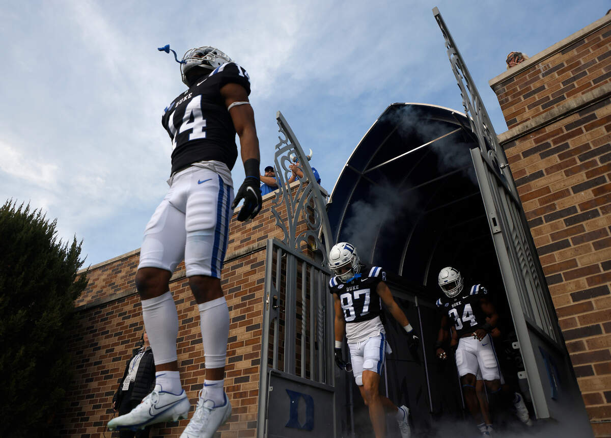 Duke players take the field prior to the Blue Devils’ final regular season game against Wake Forest at Wallace Wade Stadium on Saturday, Nov. 26, 2022, in Durham, N.C.