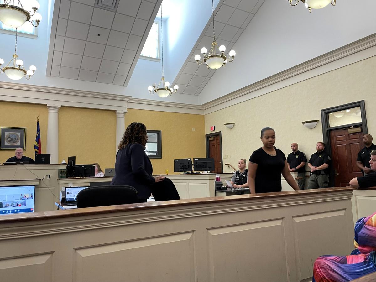Jacobia Crisp leaves an Orange County courtroom Monday, Aug. 19. 2024, after receiving a new court date. Orange County Assistant Public Defender Natasha Adams was appointed to represent her on charges of aiding and abetting an escapee and harboring a fugitive.