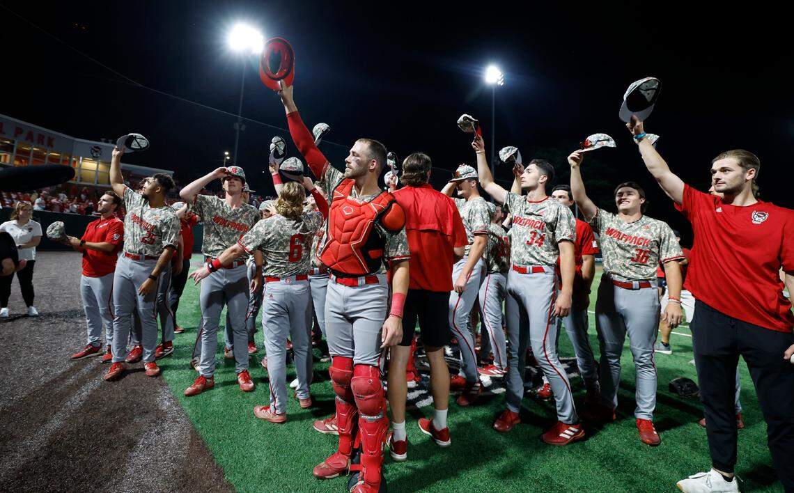 Wolfpack players acknowledge the fans after N.C. State’s 5-3 victory over James Madison in the NCAA Raleigh Regional final at Doak Field Sunday, June 2, 2024.