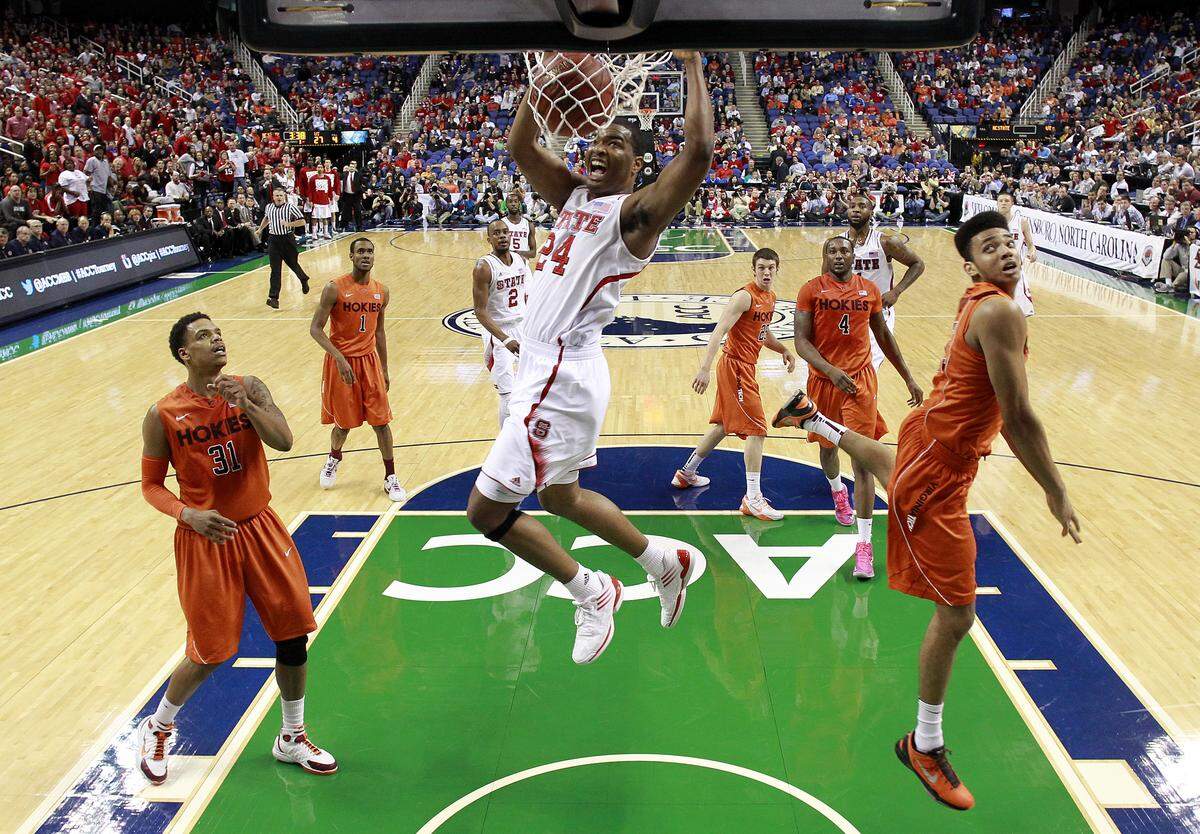 N.C. State’s T.J. Warren (24) slams in two in the first half during N.C. State’s 80-63 victory over Virginia Tech in the first round of the ACC Men’s Basketball Tournament at the Greensboro Coliseum Thursday, March 14, 2013.