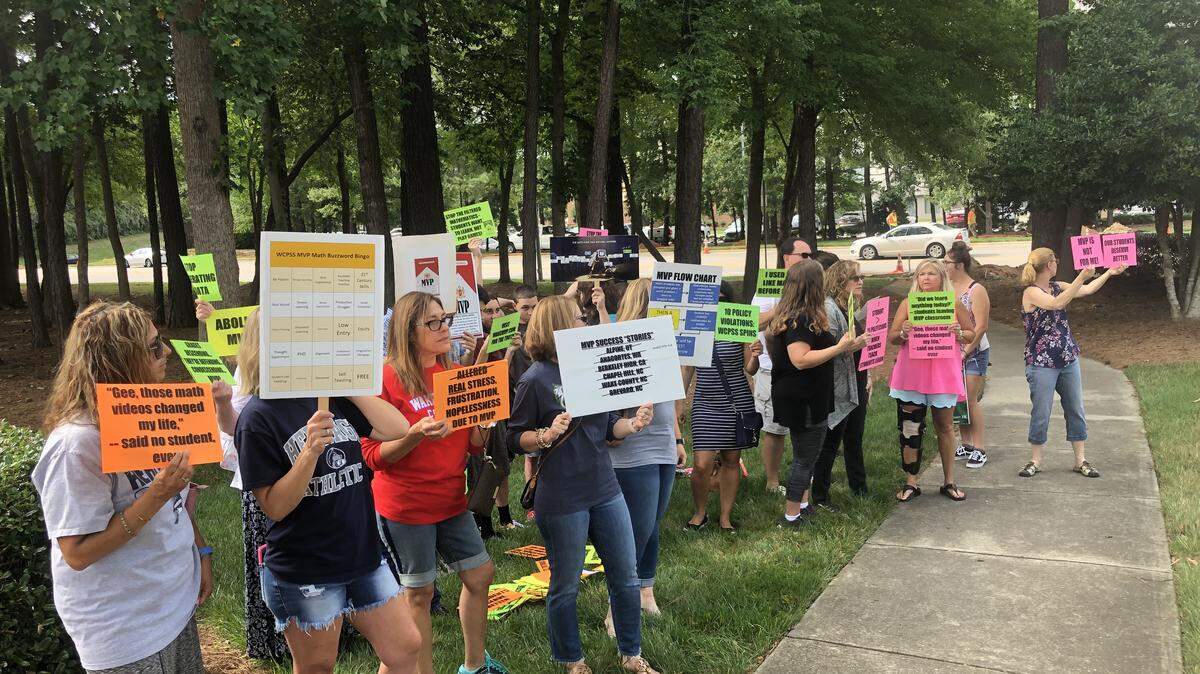 Parents and students protest the use of the MVP Math curriculum outside the Wake County Public School System’s headquarters in Cary, N.C., on June 18, 2019,