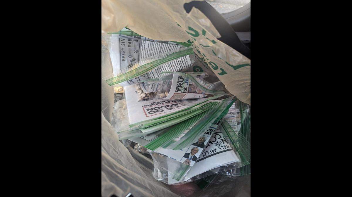 Antisemitic flyers distributed in a Raleigh neighborhood were gathered for trash on the morning of Aug. 6, 2023.