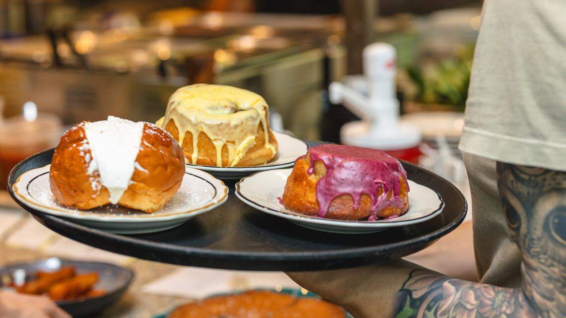 A tray of sweet buns and maritozzi from Lutra Cafe & Bakery, opening Durham this summer.