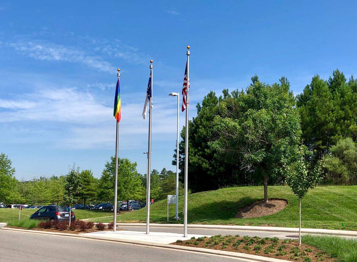 Credit Suisse flew a pride flag at the entrance of its campus during the grand opening of its new office building in Research Triangle Park on June 27, 2019.