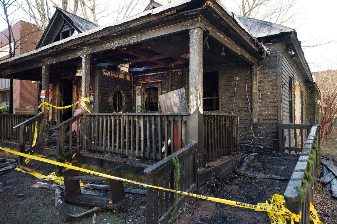 Fire badly damaged the House of Art on East Hargett Street near Moore Square in downtown Raleigh, early Tuesday morning.