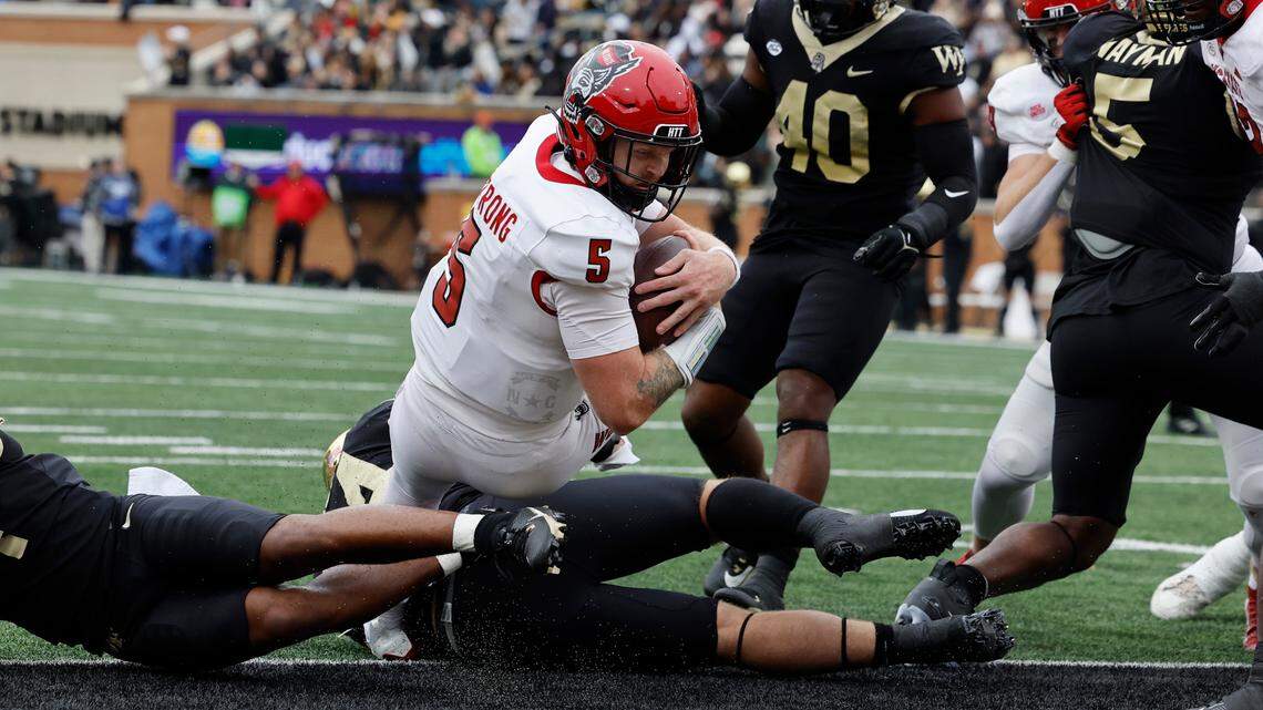 N.C. State quarterback Brennan Armstrong (5) dives in for a touchdown during the first half of N.C. State’s game against Wake Forest at Allegacy Stadium in Winston-Salem, N.C., Saturday, Nov. 11, 2023.