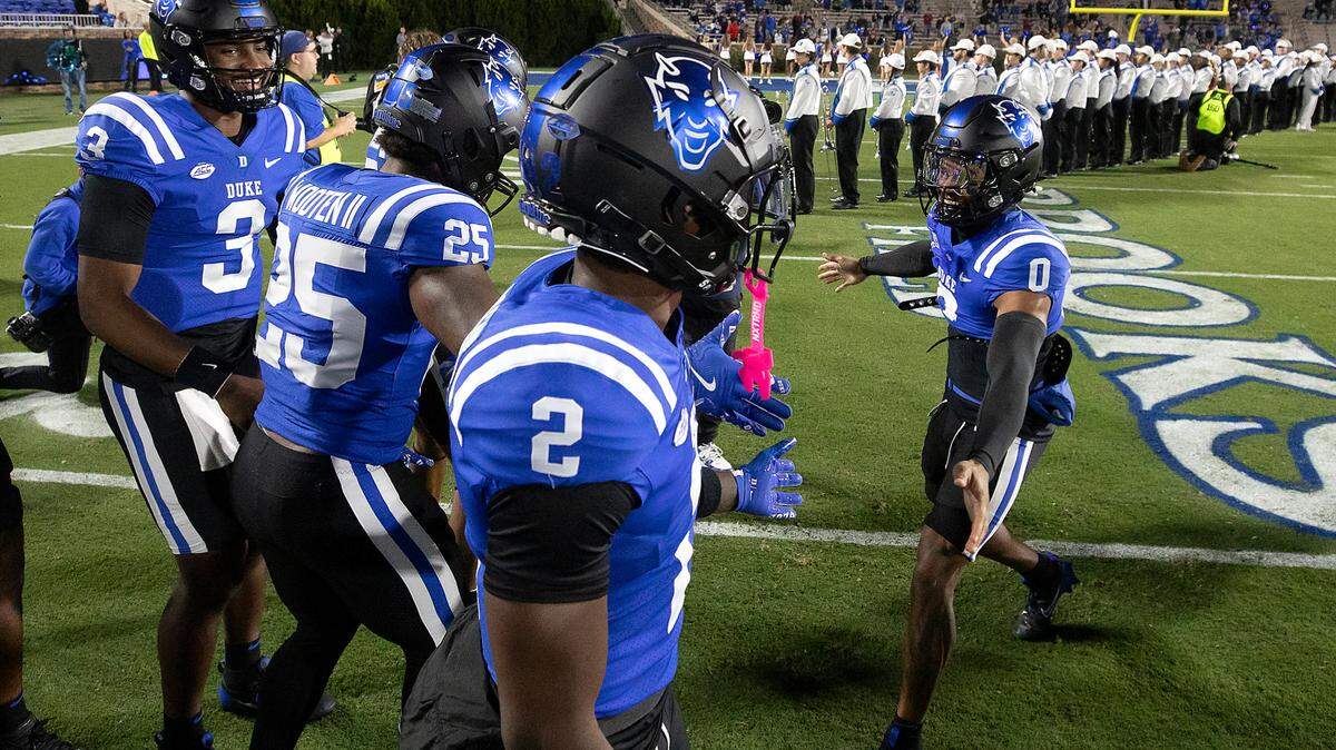 Duke’s Chandler Rivers (0) is greeted by teammates after being introduced prior to the Blue Devils’ game against Florida State on Friday, Oct. 18, 2024, at Wallace Wade Stadium in Durham, N.C.