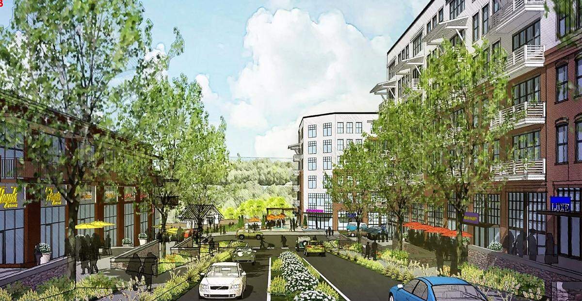 An architect’s rendering from January 2022 shows ground-floor retail and offices at the main entrance to South Creek at the intersection of Market Street and U.S. 15-501, across from Southern Village.