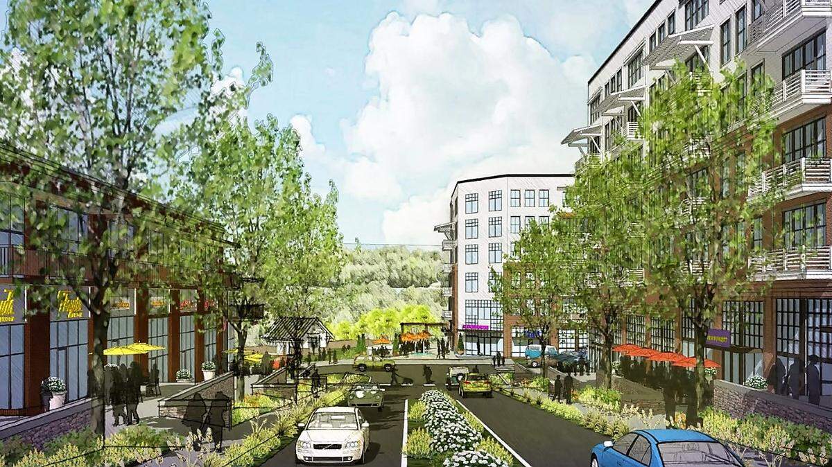 An architect’s rendering from January 2022 shows ground-floor retail and offices at the main entrance to South Creek at the intersection of Market Street and U.S. 15-501, across from Southern Village.