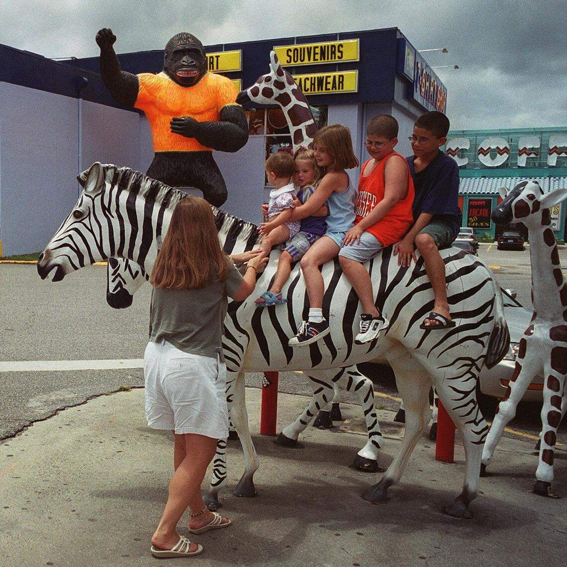Travelers often stop at South of the Border to take photos with statues across the property. 