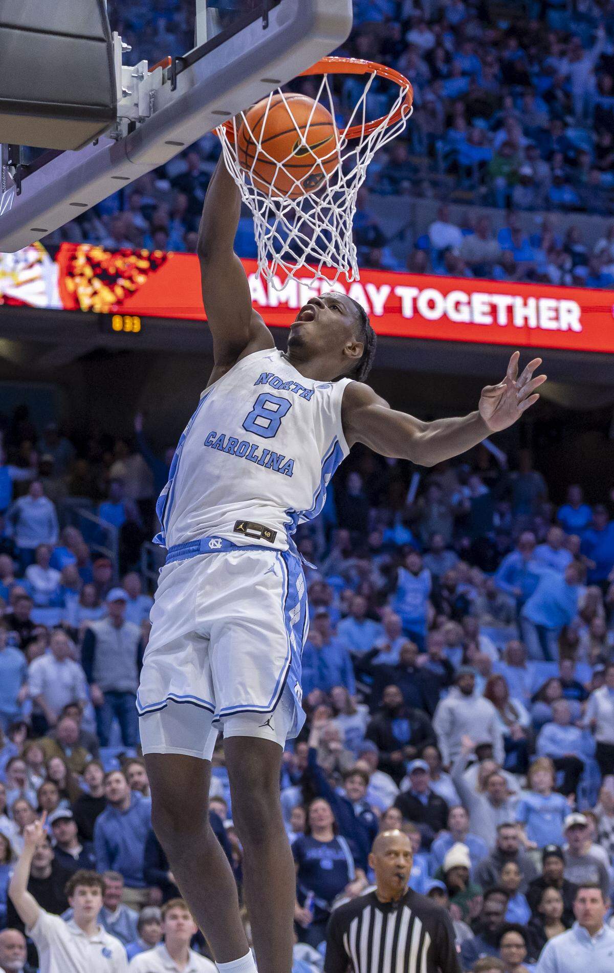 North Carolina forward Caleb Wilson (8) soars to the rim on a fast break for a dunk in the second half against Notre Dame on Wednesday, January 21, 2026 at the Smith Center in Chapel Hill, N.C. Wilson lead all scores with 22 points in the Tar Heels’ 91-69 victory. 