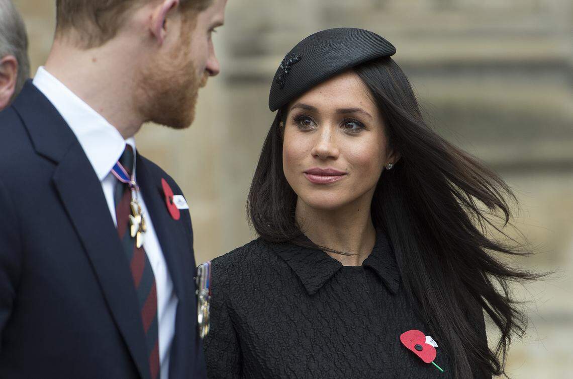 Britain's Prince Harry and Meghan Markle attend a Service of Thanksgiving and Commemoration on ANZAC Day at Westminster Abbey in London on April 25, 2018.