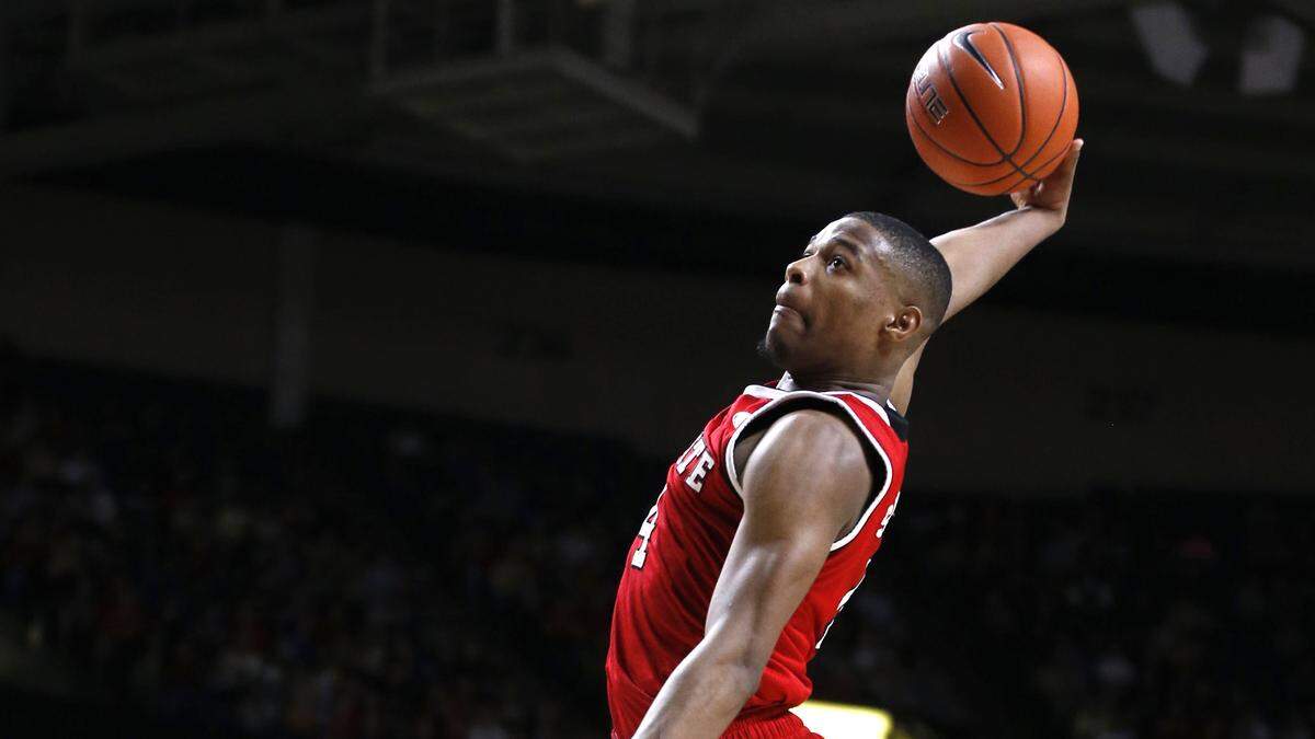 N.C. State’s Dennis Smith Jr. (4) heads to slam in two during the first half of N.C. State’s game against Wake Forest at Lawrence Joel Veterans Memorial Coliseum in Winston-Salem, N.C., Sat. Feb. 11, 2017.