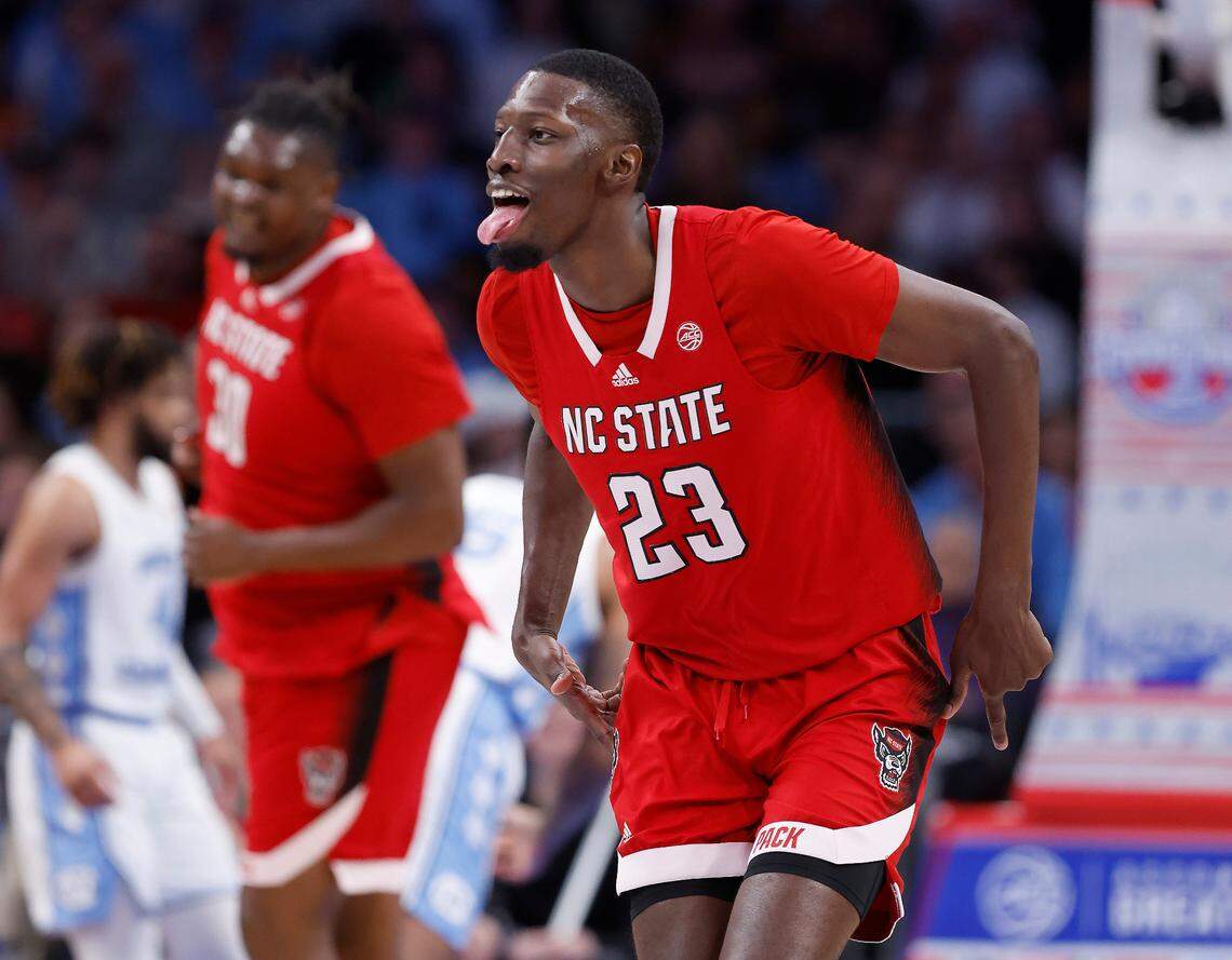 N.C. State’s Mohamed Diarra (23) celebrates making a three-pointer during the first half of N.C. State’s game against UNC in the championship game of the 2024 ACC Men’s Basketball Tournament at Capital One Arena in Washington, D.C., Saturday, March 16, 2024.