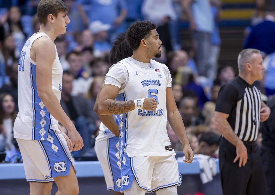 North Carolina guard Elijah Davis (6) and center Ivan Matlekovic (40) enter the game in the final minutes of play against East Carolina on Monday, December 22, 2025 at the Smith Center in Chapel Hill, N.C.