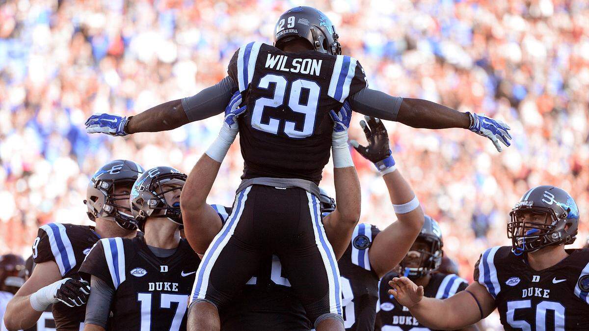 Duke running back Shaun Wilson (29) is held aloft after scoring a Duke touchdown in the first quarter of play against Virginia Tech at Wallace Wade Stadium in Durham, N.C. Saturday, Nov. 5, 2016.