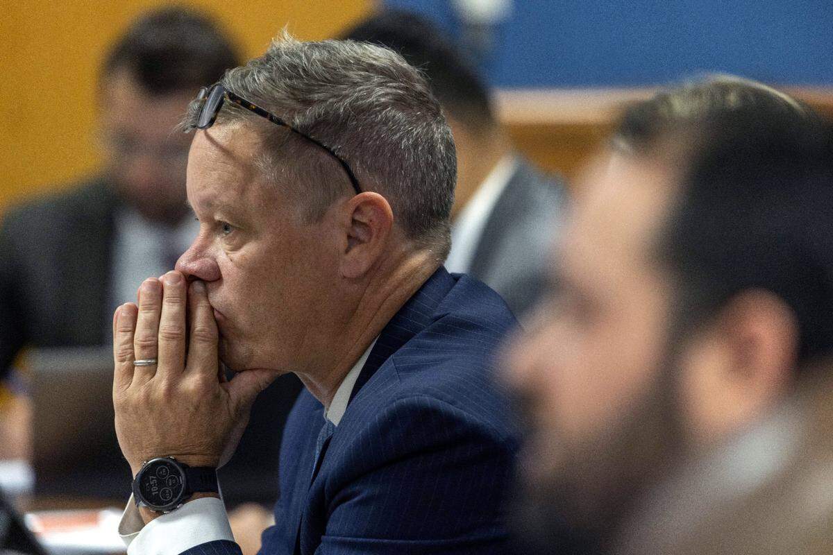 Oct 16, 2023; Atlanta, GA, USA; Attorney Brian Rafferty, who is representing defendant Sidney Powell, listens to Fulton County Superior Judge Scott McAfee during a jury questionnaire hearing at the Fulton County Courthouse on October 16, 2023 in Atlanta, Georgia Eighteen people, including former President Donald Trump, have been charged in a criminal case concerning the Fulton County 2020 election interference in Georgia. Mandatory Credit: Alyssa Pointer/Pool via USA TODAY NETWORK