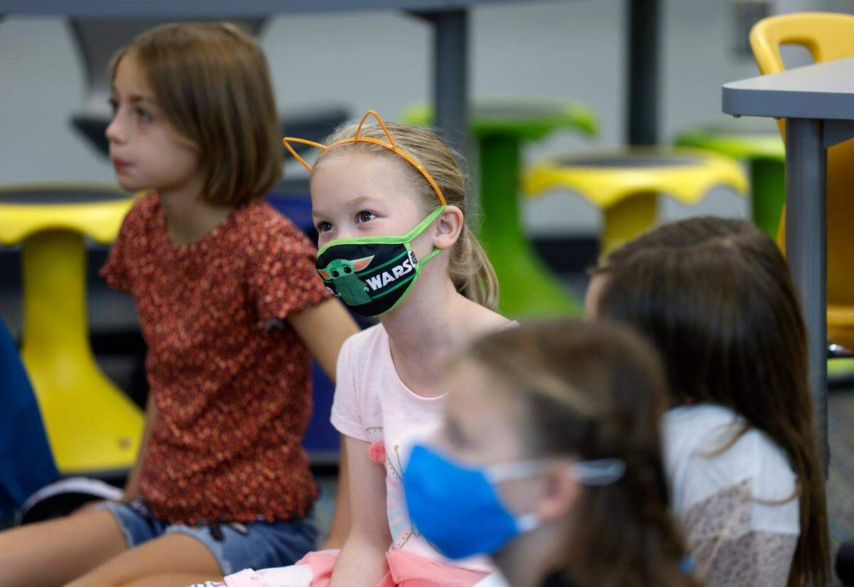 Students listen in a third grade class on the first day of school at Apex Friendship Elementary School on Monday, Aug. 29, 2022, in Apex, N.C.