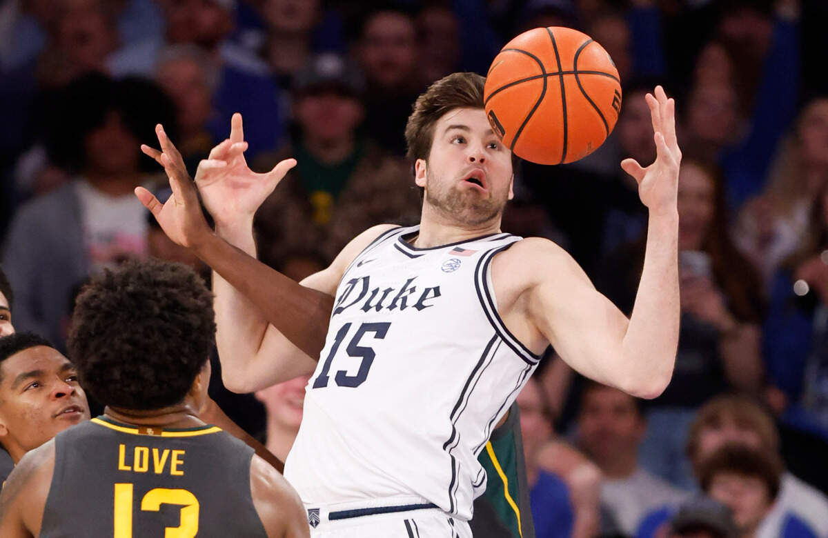 Duke’s Ryan Young (15) pulls in a rebound during the second half of Duke’s 78-70 victory over Baylor at Madison Square Garden in New York City Wednesday, Dec. 20, 2023.