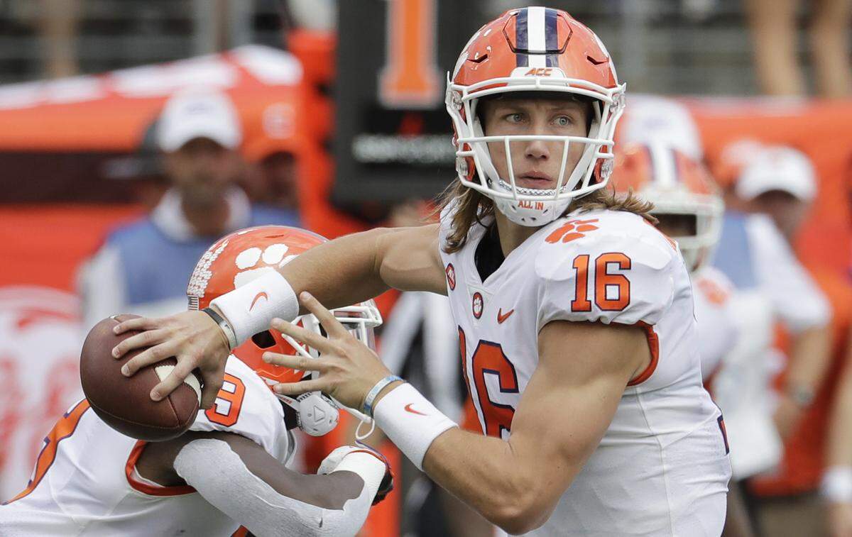 Clemson’s Trevor Lawrence (16) looks to pass against Wake Forest during the first half of an NCAA college football game in Charlotte, N.C., Saturday, Oct. 6, 2018. 