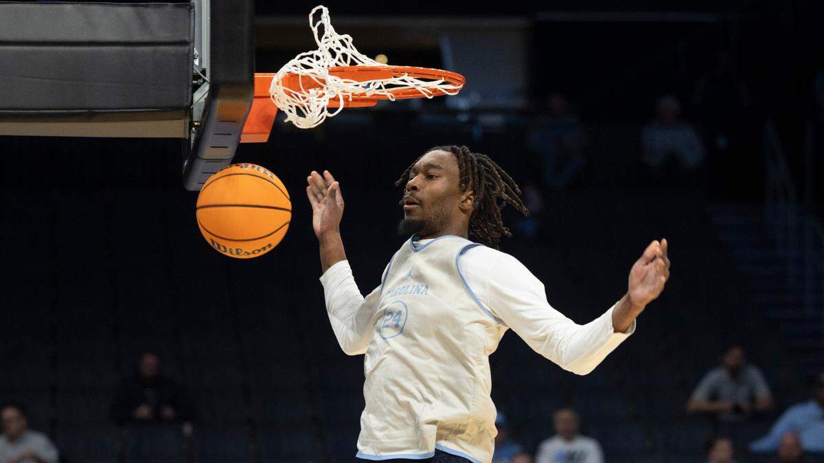North Carolina’s Jae’Lyn Withers (24) dunks during practice on Wednesday, March 20, 2024 as the Tar Heels prepare for the NCAA Tournament at Spectrum Center in Charlotte, N.C.