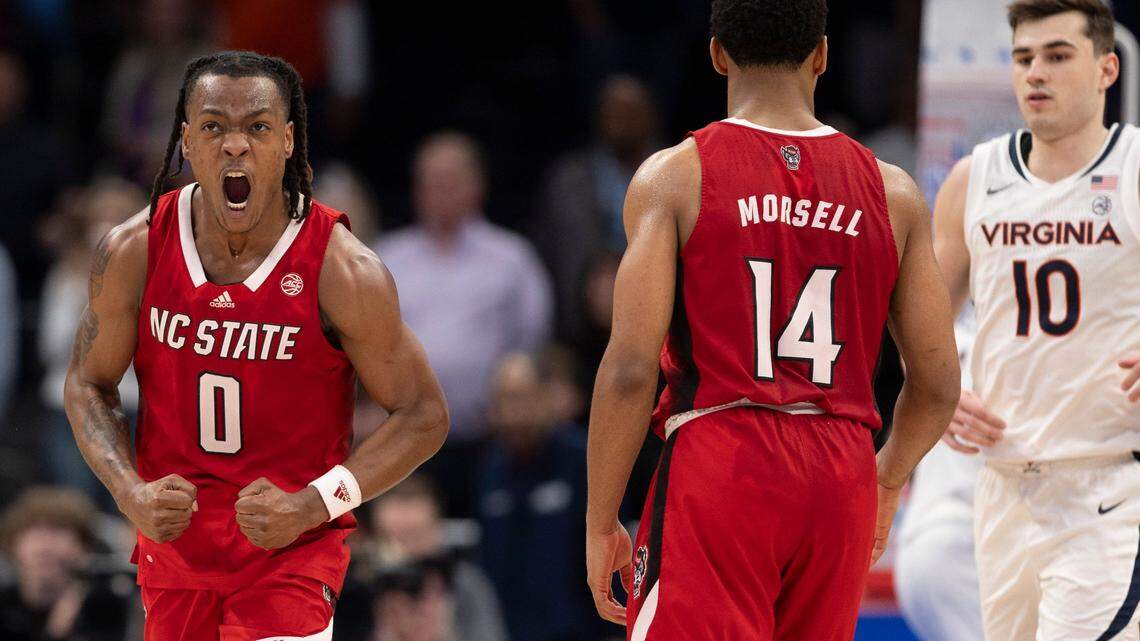 N.C. State’s D.J. Horne (0) reacts after sinking two free throws with ten seconds to play, to secure the Wolfpack’s 73-65 overtime victory over Virginia in the semi-finals of the ACC Men’s Basketball Tournament at Capitol One Arena on Friday, March 15, 2024 in Washington, D.C.