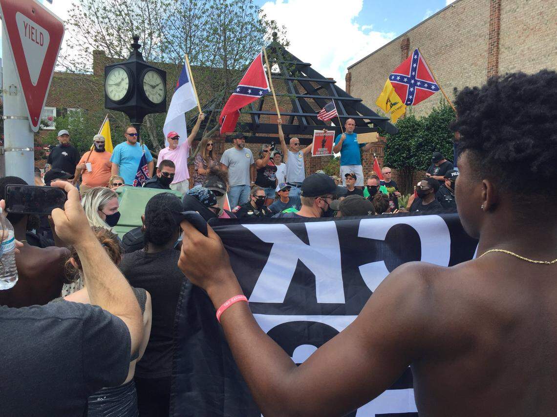 Anti-racist protesters and Confederate statue defenders came face to face in demonstrations in downtown Graham on Saturday, July 11, 2020.