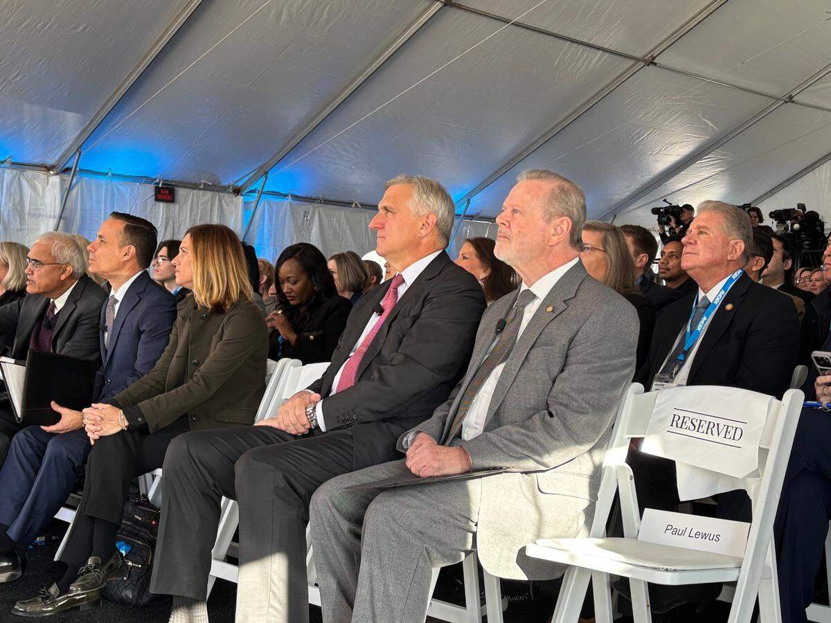 North Carolina Senate Leader Phil Berger sits with Amgen CEO Robert Bradway during a ceremony marking Amgen’s new drug substance production plant in Holly Springs, NC on Jan. 24, 2025.