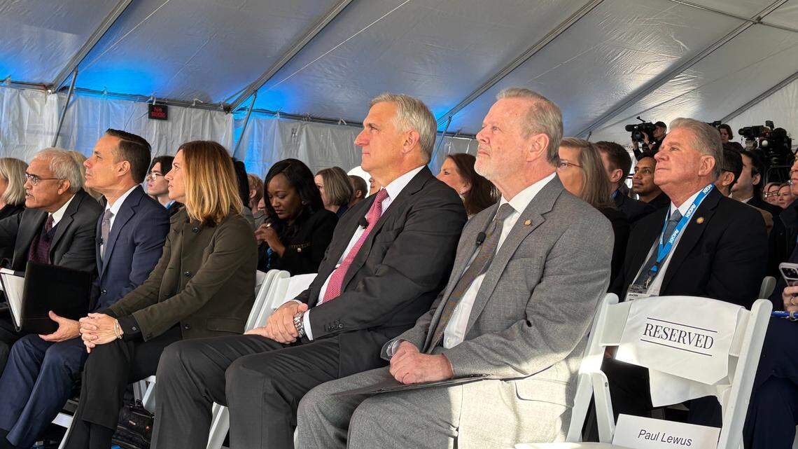 North Carolina Senate Leader Phil Berger sits with Amgen CEO Robert Bradway during a ceremony marking Amgen’s new drug substance production plant in Holly Springs, NC on Jan. 24, 2025.