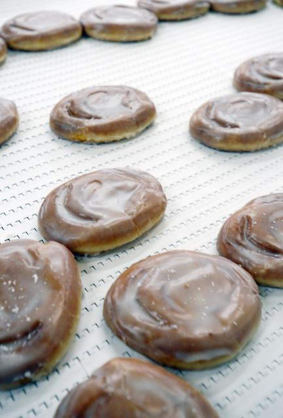 Carolina Foods’ Duchess brand honey buns are packaged as they travel along the conveyor belt. Carolina Foods Inc., creator of one of America's first honey buns and the Duchess brand, is celebrating its 80th anniversary.
