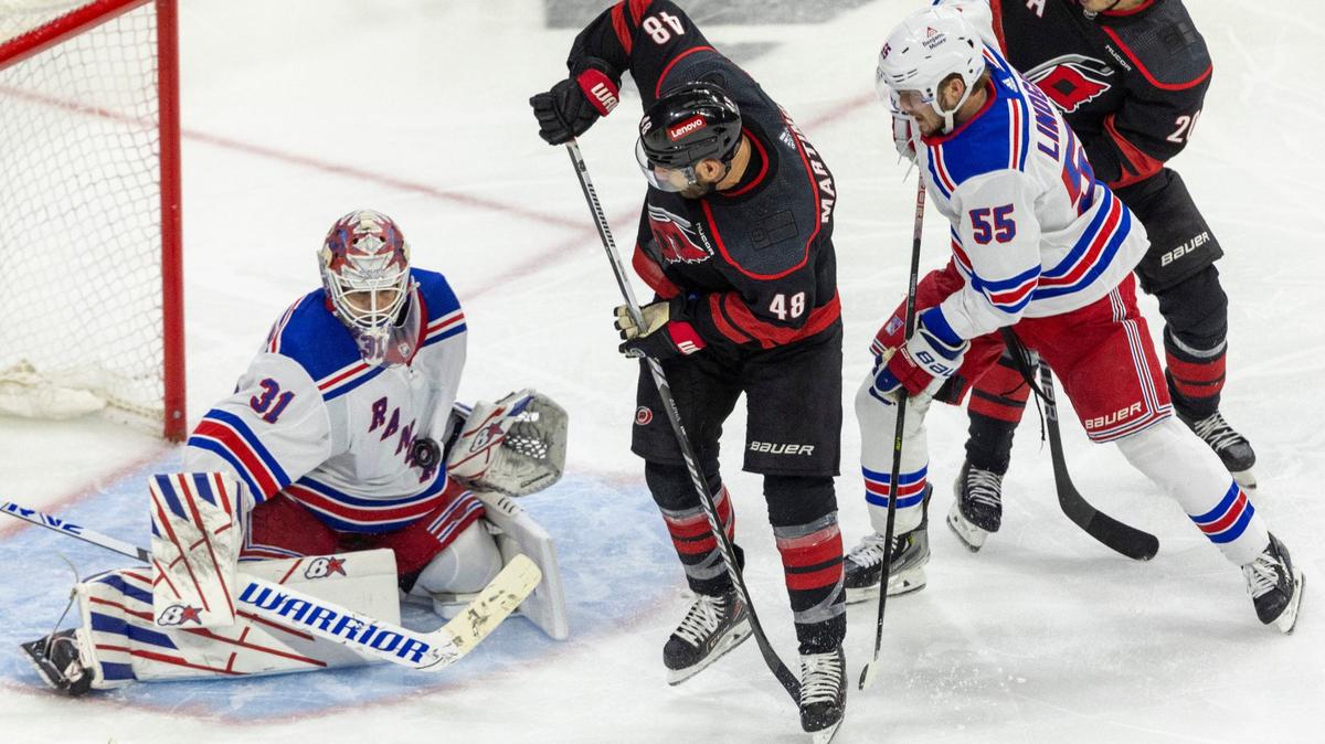 New York Rangers goaltender Igor Shesterkin (31) stops a scoring attempt by Carolina Hurricanes left wing Jordan Martinook (48) in the third period of Game 3 in the second round of the 2024 Stanley Cup playoffs on Thursday, May 9, 2024 at PNC Arena, in Raleigh N.C.