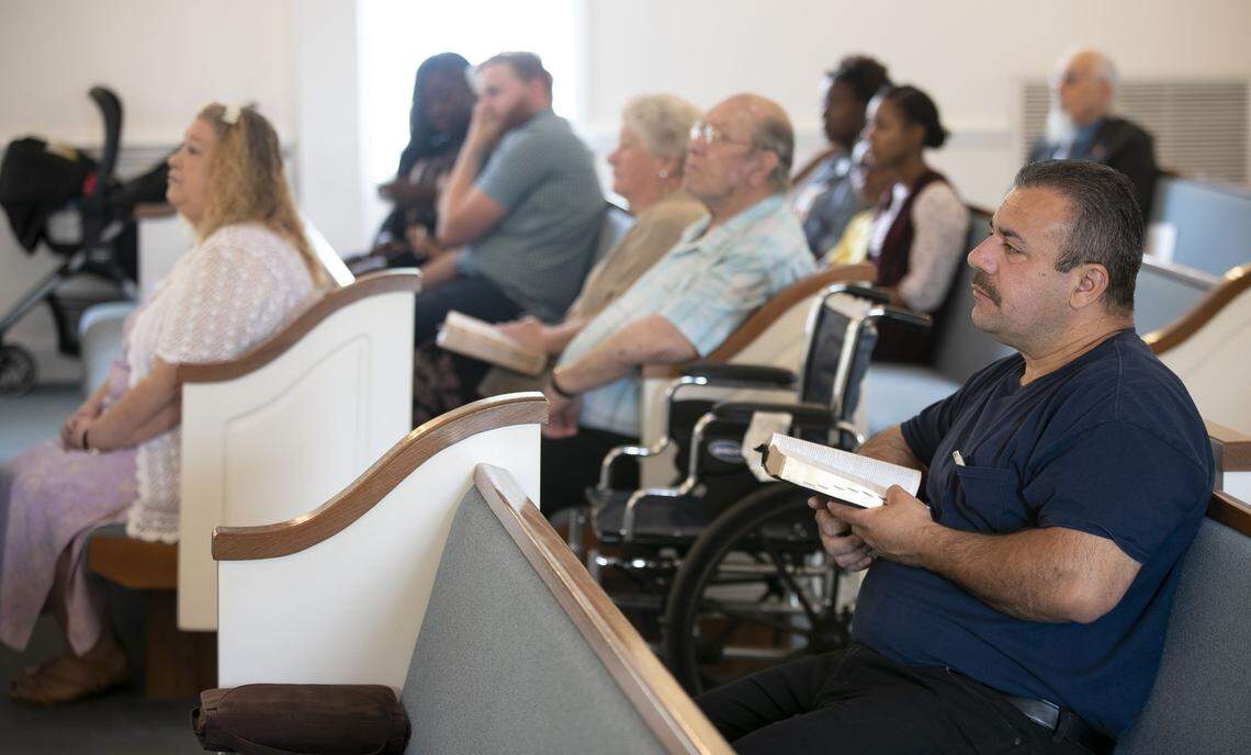 With families sitting together, and separating themselves safely from other families, more than two dozen members of Brookhaven Baptist Church gathered inside their sanctuary for their 11 a.m. worship service on Sunday, May 17, 2020 in Greensboro, N.C.