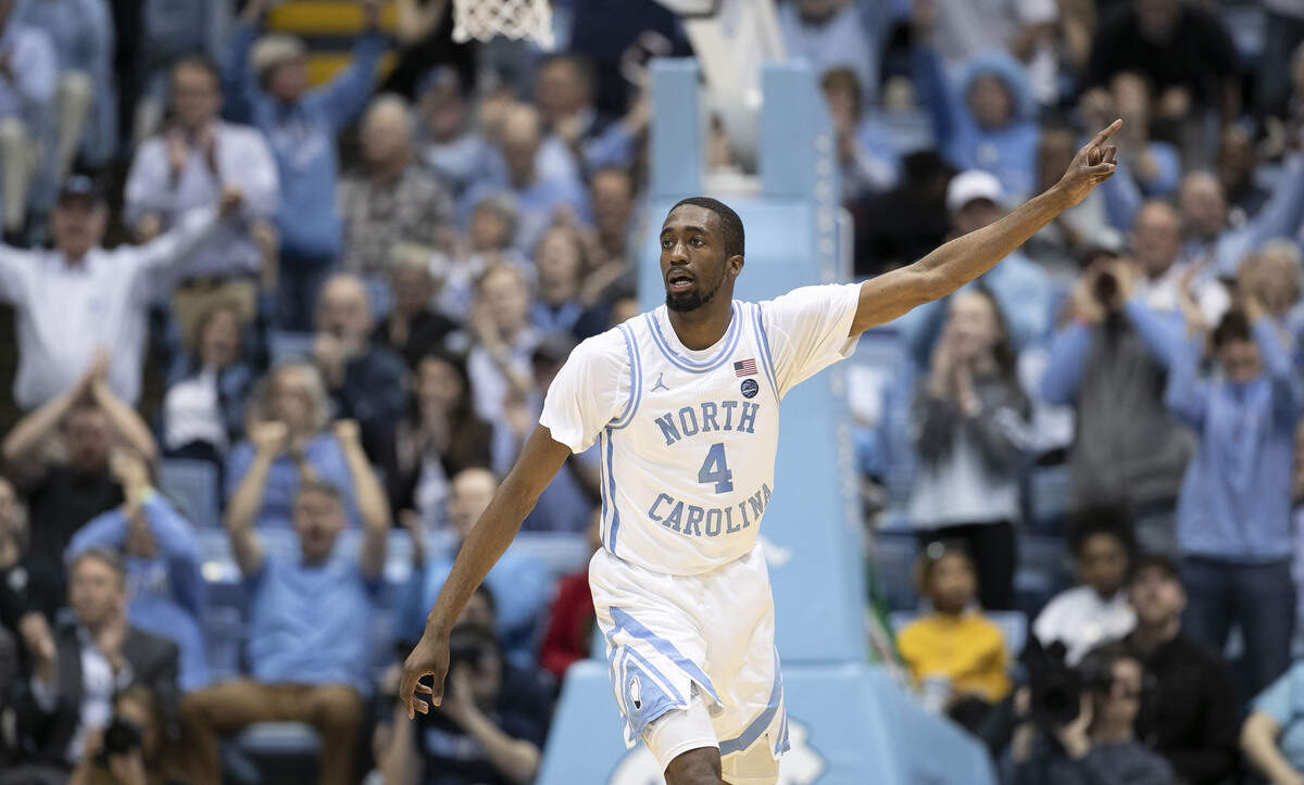 North Carolina’s Brandon Robinson (4) reacts after sinking a three-point basket in the second half against Wake Forest on Tuesday, March 3, 2020 at the Smith Center in Chapel Hill, N.C. Robinson scored 18 points in the Tar Heels’ 93-83 victory over Wake Forest.