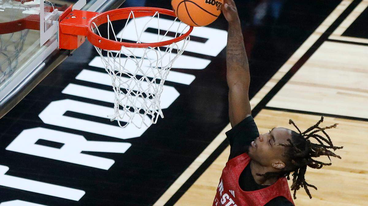 N.C. State’s Kam Woods dunks the ball during a practice on Wednesday, March 20, 2024, at PPG Paints Arena in Pittsburgh, Pa. The Wolfpack face sixth-seeded Texas Tech in the first round of the NCAA Tournament on Thursday.