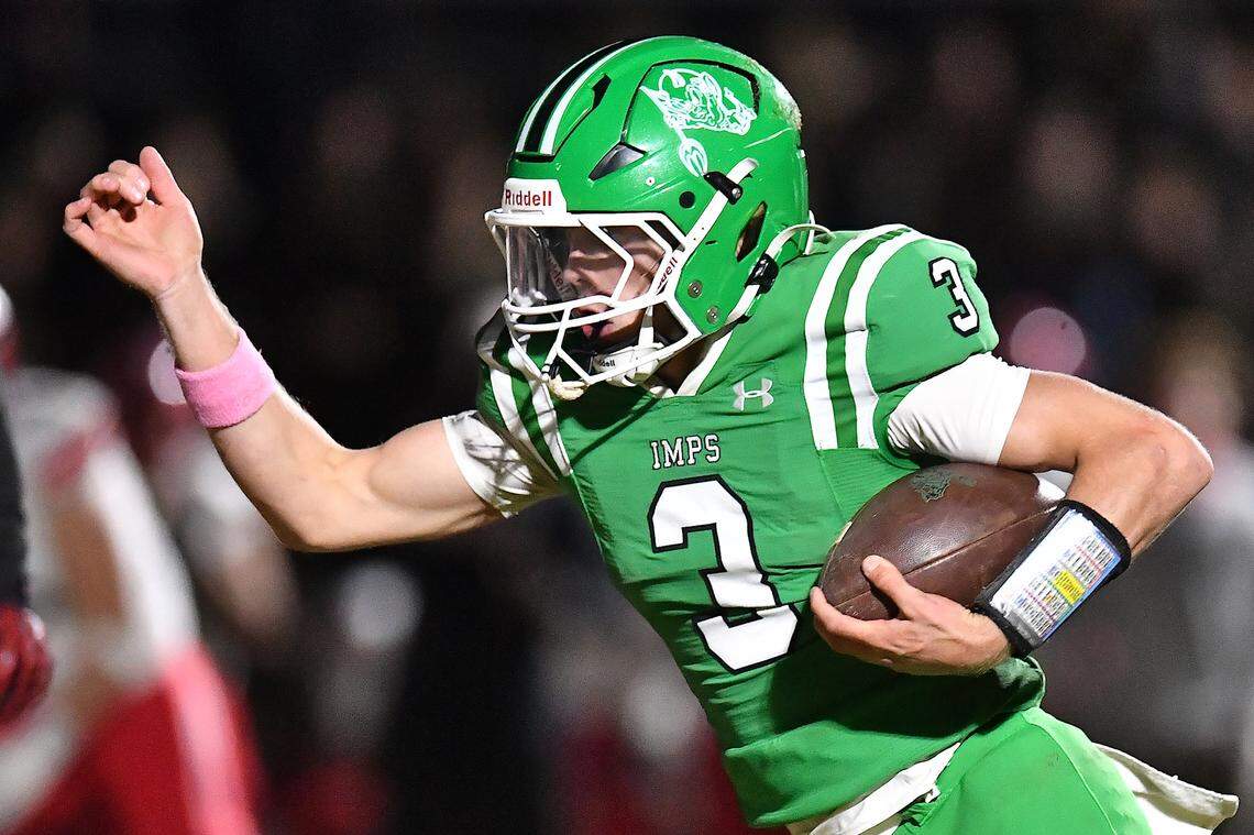 Cary quarterback Nick Grena (3) runs for yardage against Middle Creek during the first half. The Cary Imps and the Middle Creek Mustangs met in a conference football game in Cary, N.C. on October 24, 2025