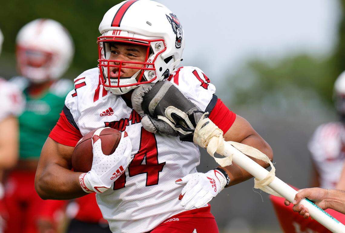 N.C. State tight end Cedd Seabrough (14) runs drills during the Wolfpack’s first fall practice in Raleigh, N.C., Wednesday, August 2, 2023.