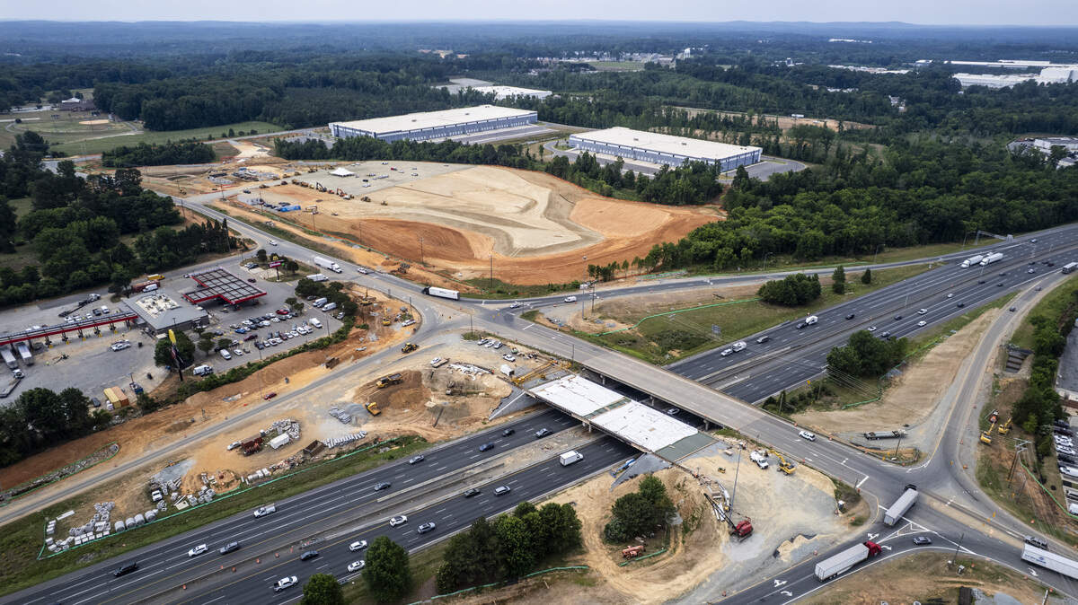 An aerial view shows the site of a future Buc-ee's travel center on Wednesday, June 10, 2026, off Exit 152 on Interstates 85 and 40 in Mebane. The Texas-based company plans to build a 74,000-square-foot store that could open by the end of 2027, featuring 120 fuel pumps, 650 parking spaces and 24 electric vehicle charging stations.